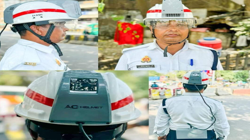 গরম কাটাতে ট্রাফিক পুলিশের মাথায় ‘এসি হেলমেট’ গরম কাটাতে ট্রাফিক পুলিশের মাথায় ‘এসি হেলমেট’